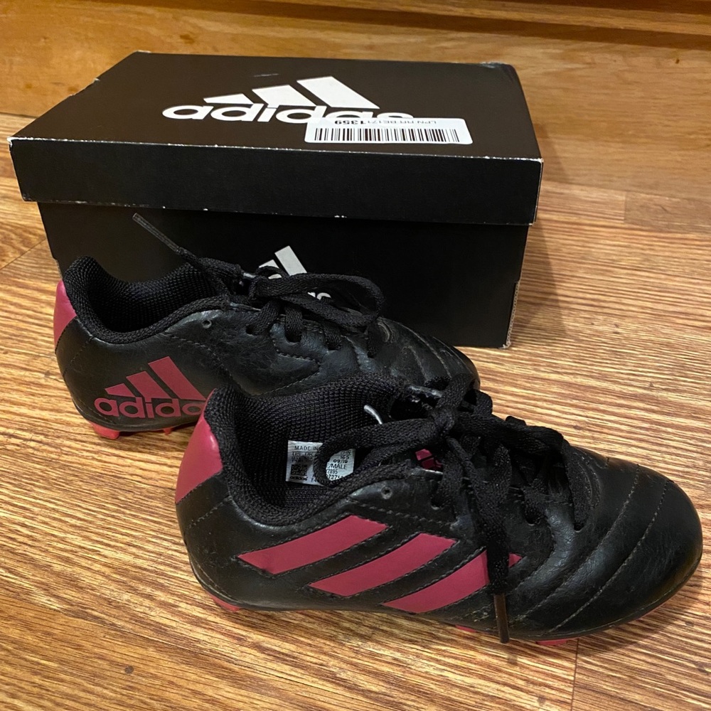 Adidas pink and black soccer cleats, size 10 1/2